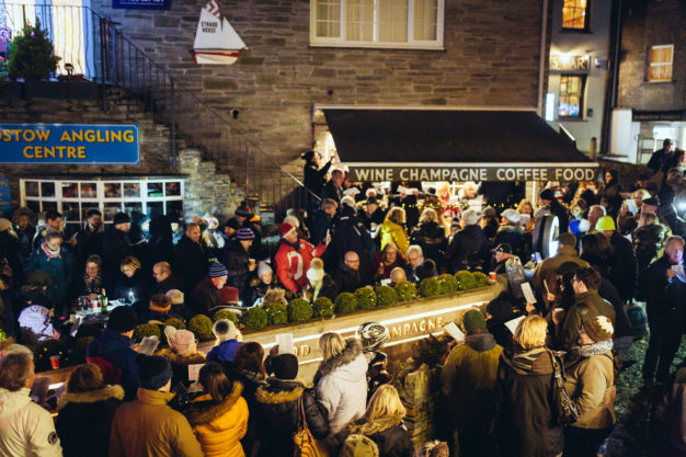 A group of people enjoying the Padstow Christmas Festival
